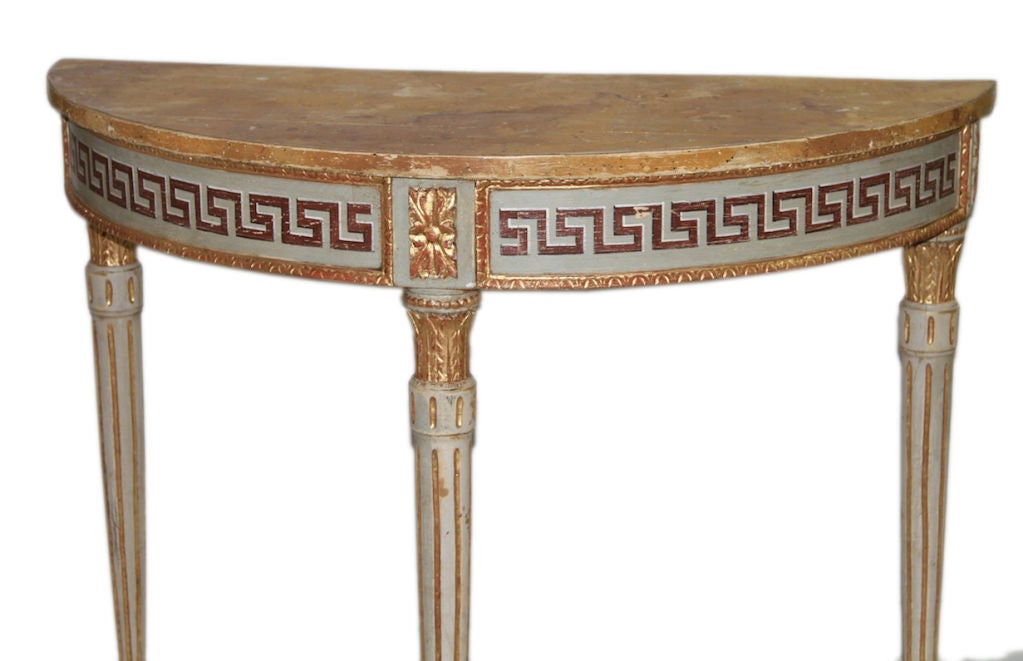 A Fine Pair of Painted Demi-lune Consoles