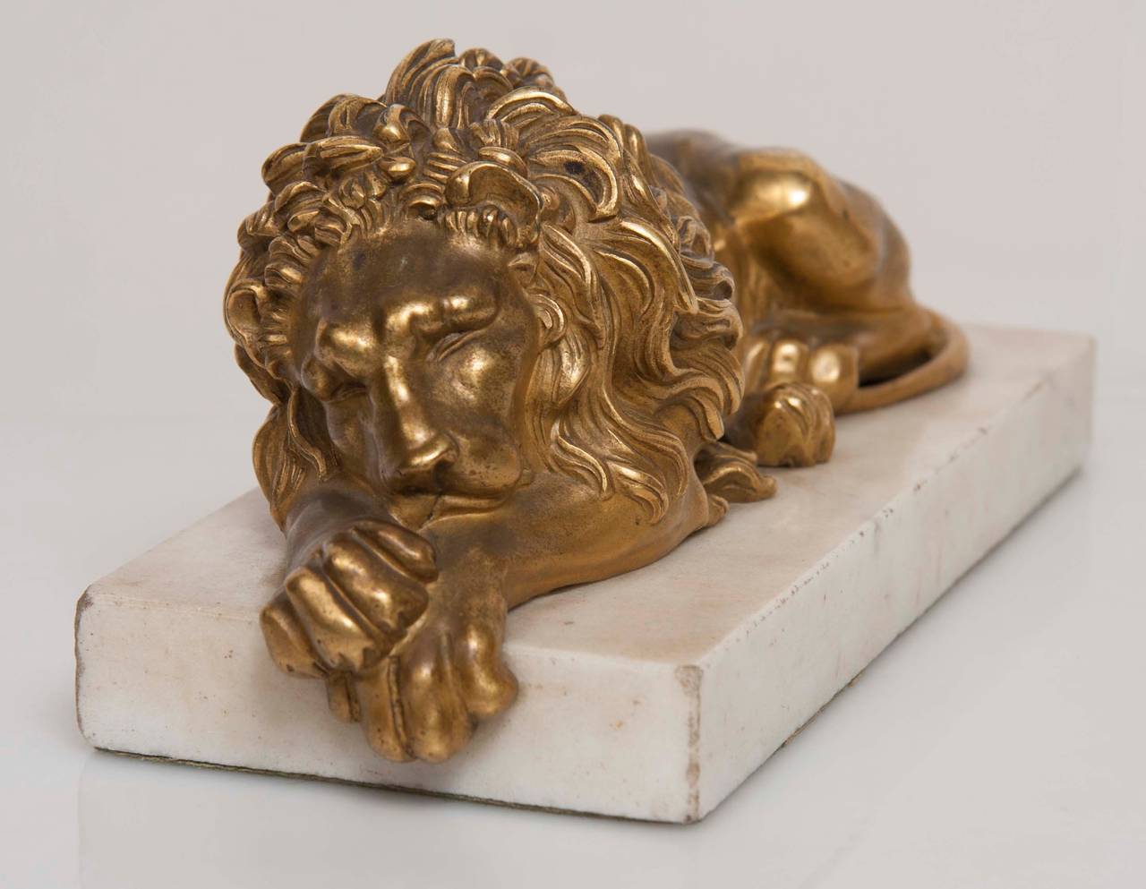 European Gilt and Bronze Recumbent Lion Sculptures