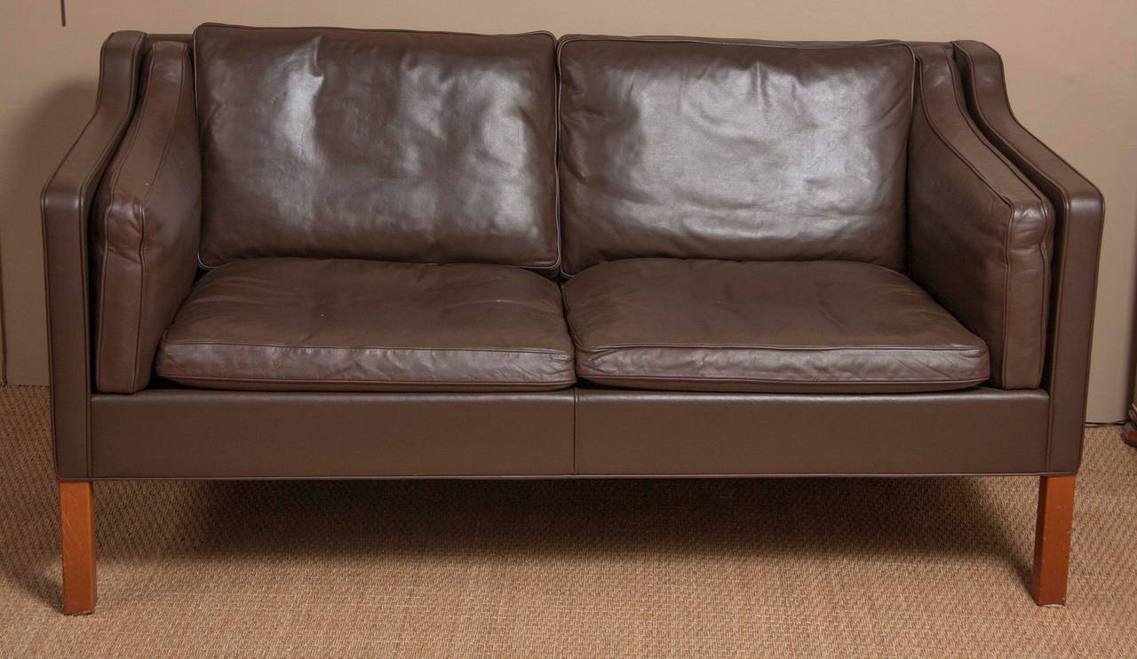 A leather sofa by Børge Mogensen for Frederica furniture with walnut legs. Made in Denmark in the 1960s.