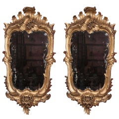 Paire de miroirs florentins dorés