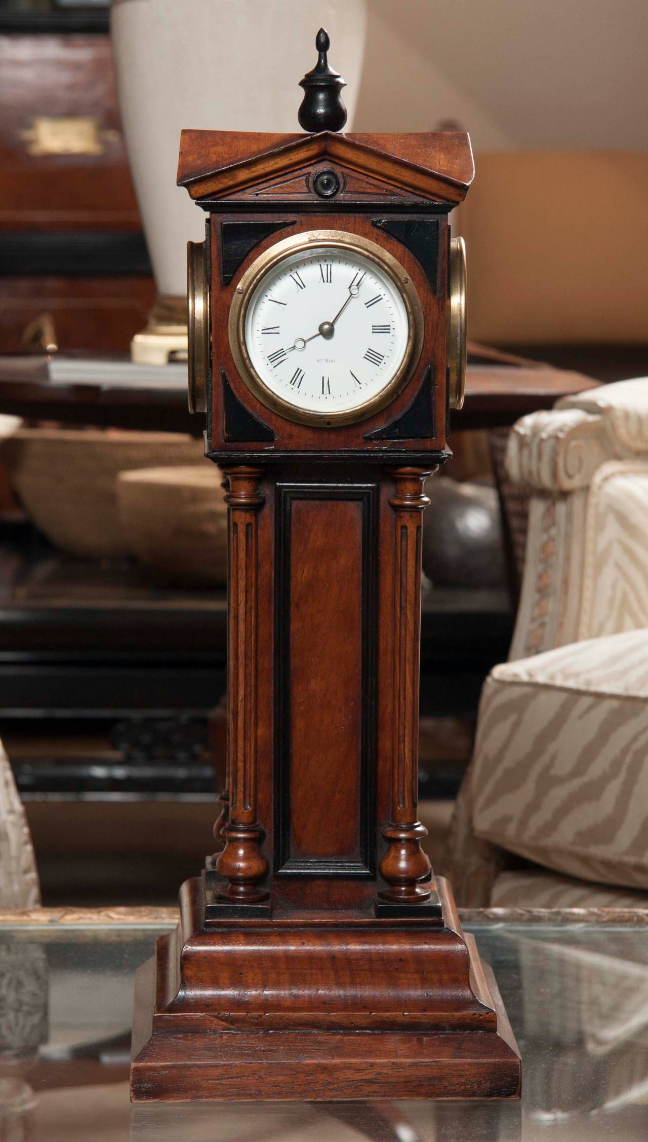 Walnut 4 dial tower table clock by Patent, Blumberg & Co, Ltd., Paris & London. Walnut clock tower style case with turned and fluted corner columns, raised panels and ebonized trim; has 4 identical 3 inch porcelain dials signed 