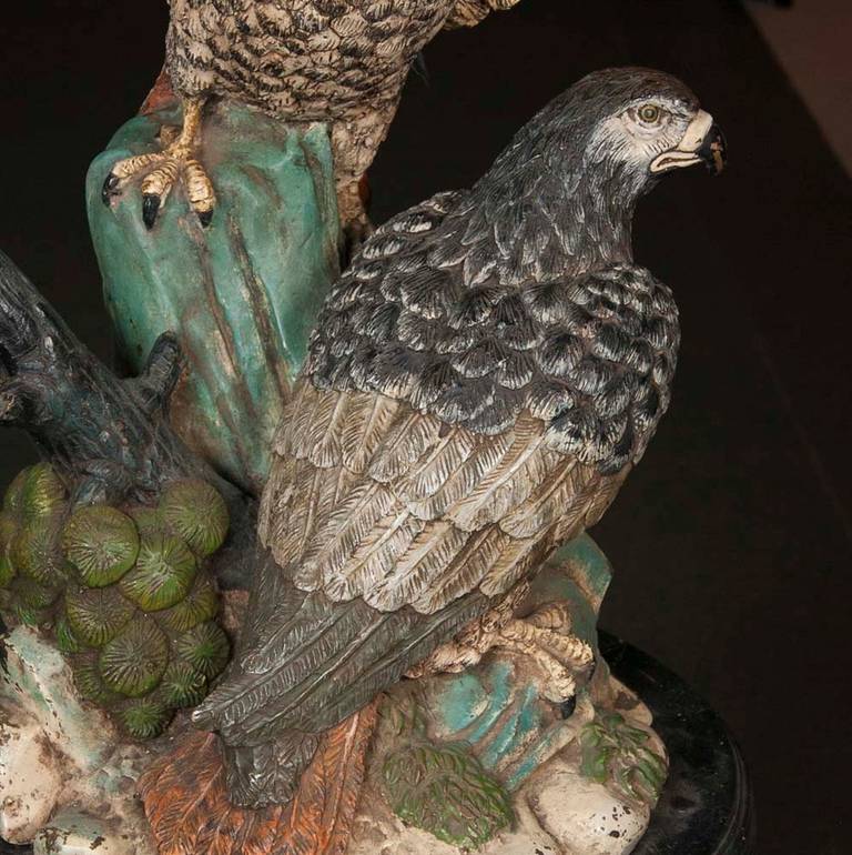 An early 20th century cold painted monumental size bronze sculpture of male and female birds of prey. Male and female falcons. Exceptional detail. Cold painted layered to show realistic color. Very small edition. Could have been made for exhibition