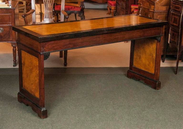 An English sofa or console table with mahogany, calamander and burl wood inlay.