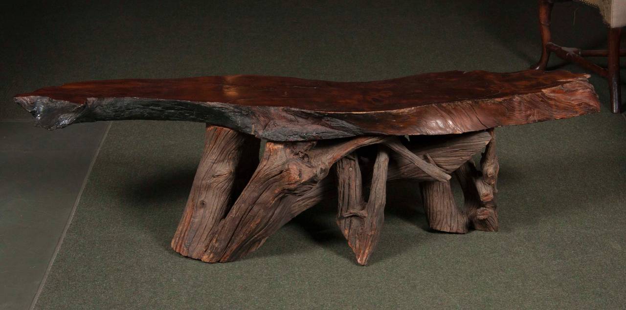 American rustic branch table with slab top.  Three available.