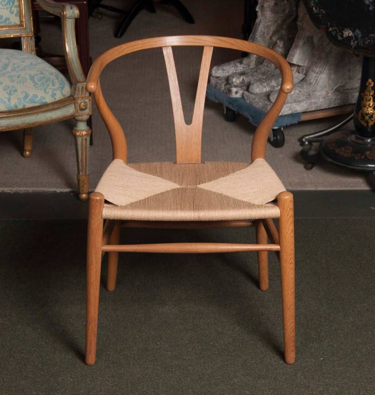Six Wishbone Dining Chairs Designed by Hans Wegner And Produced by Carl Hansen In Excellent Condition In Stamford, CT