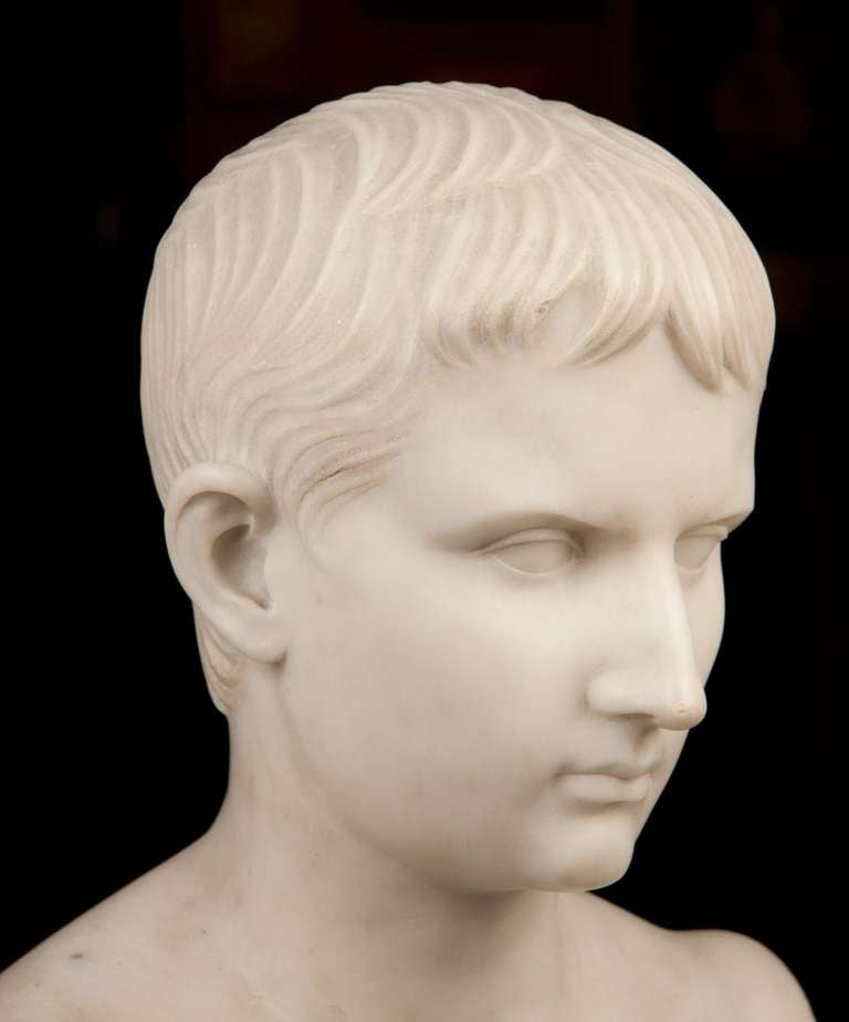 A 19th century marble bust of Augustus Ceasar modeled after Octavian.