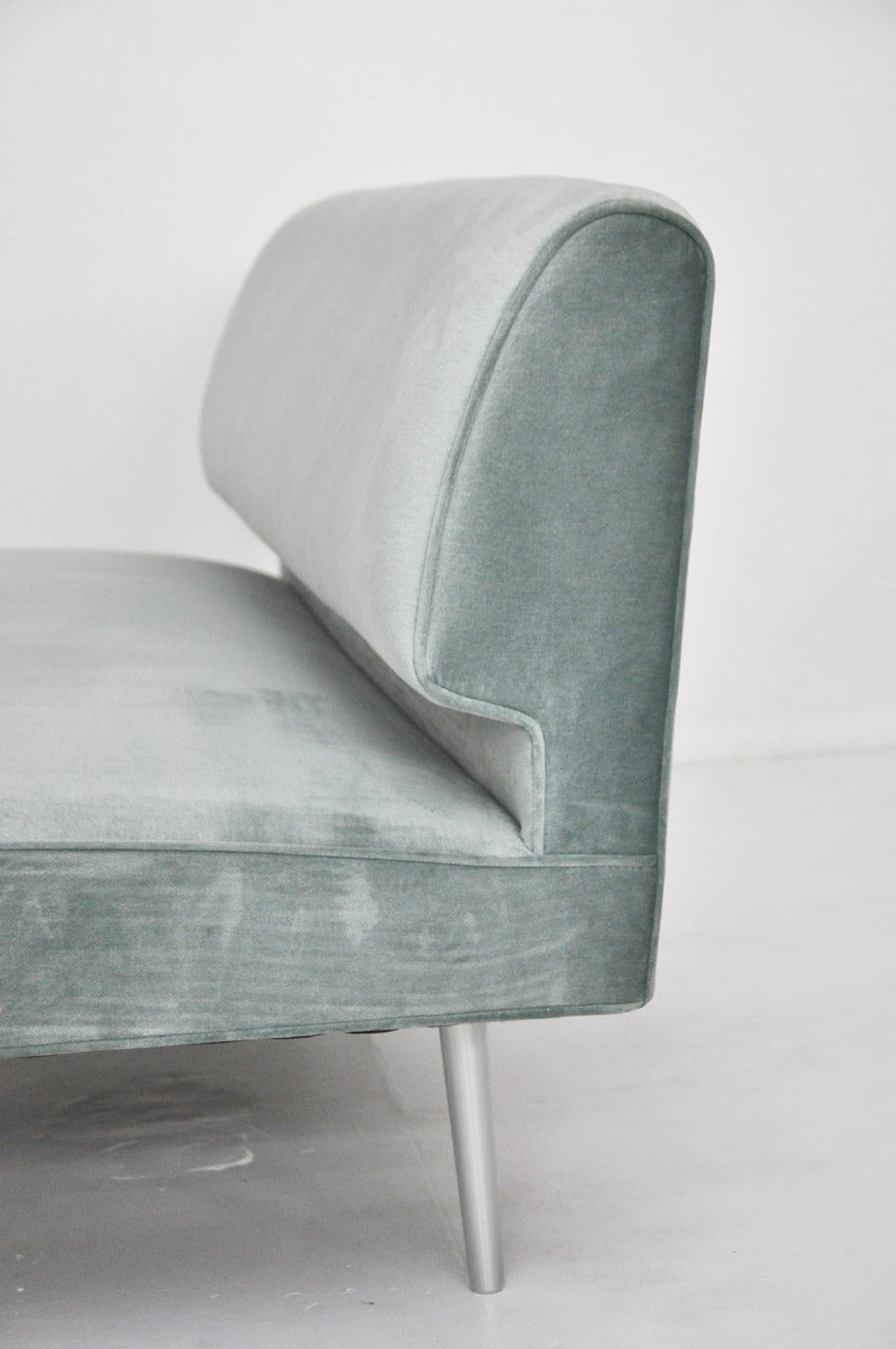 Slipper settee by Edward Wormley for Dunbar.  Vintage velvet upholstery with brushed aluminum legs.