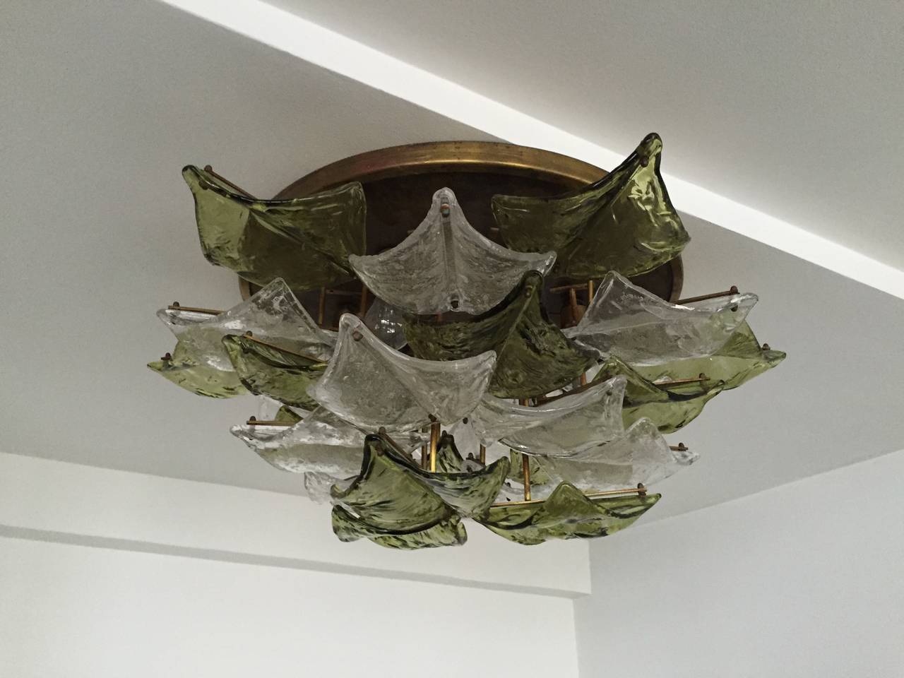 Flush mount chandelier. Brass with Murano glass leaf shades, Italian, circa 1960s.