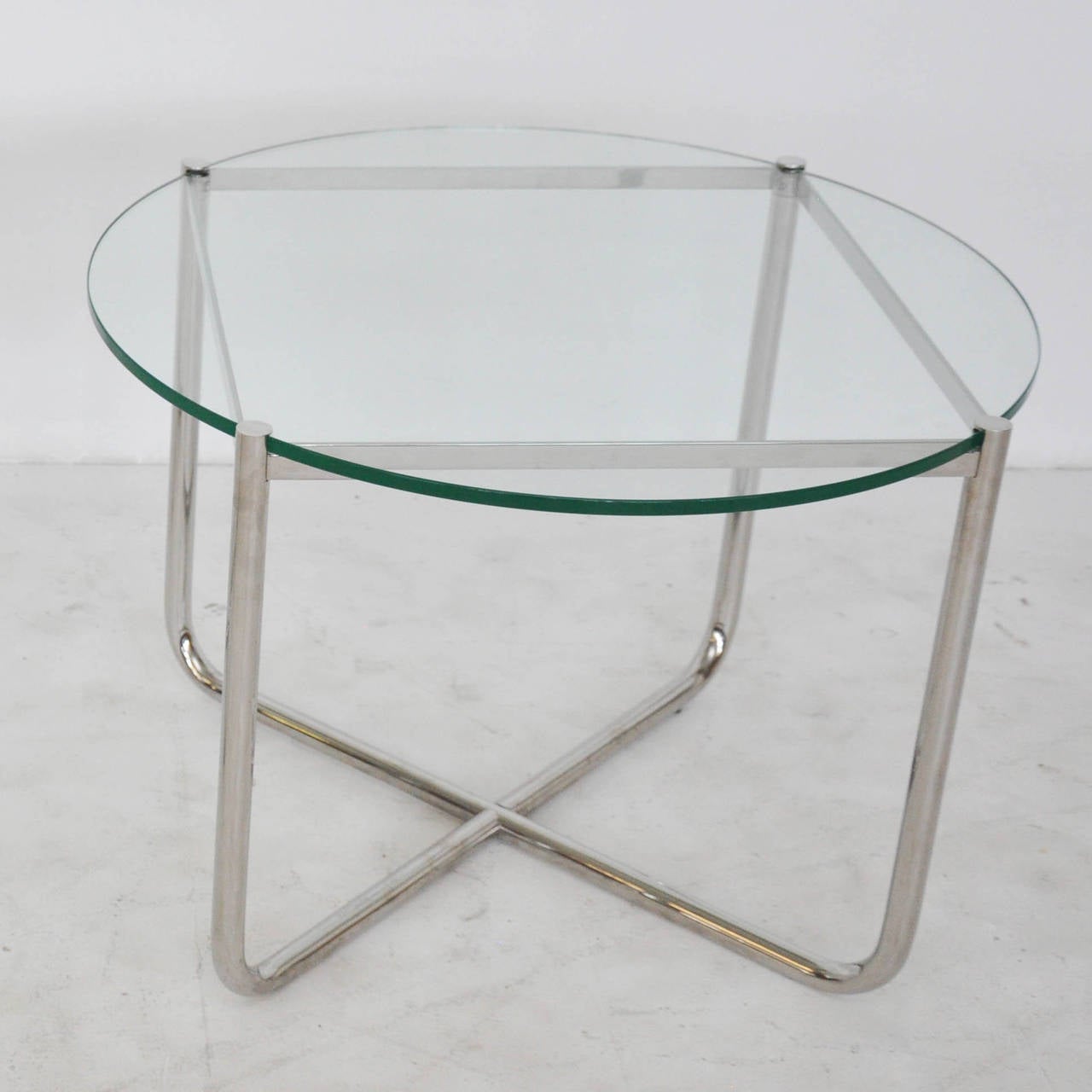 MR table by Ludwig Mies van der Rohe for Knoll. Stainless steel frame with glass top.