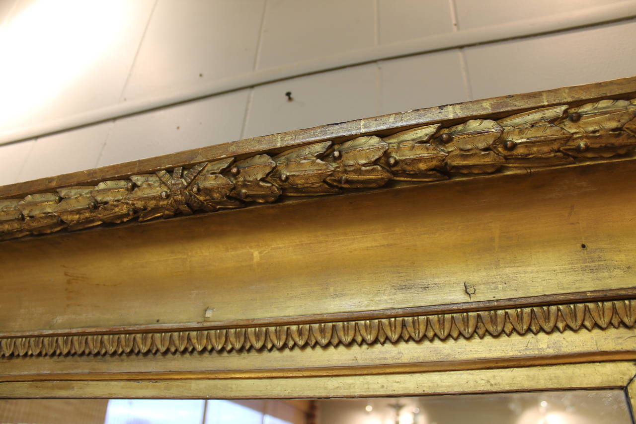 Large and Heavy Deep-Carved 19th Century Gilt Mirror In Good Condition For Sale In Charlotte, NC