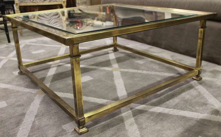 Brass and glass coffee table from the pace collection by Mastercraft .