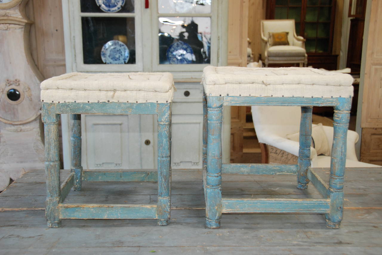 Pair of 19th century Gustavian stools with turned legs and stretchers. Lovely green blue color.