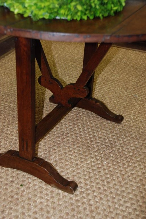 Beautiful French Walnut Vendange Table. All original. Lovely carriage and scalloped base.
