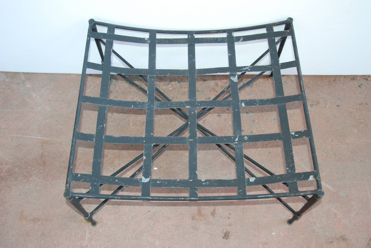 Pair of Mid-Century iron ottomans.