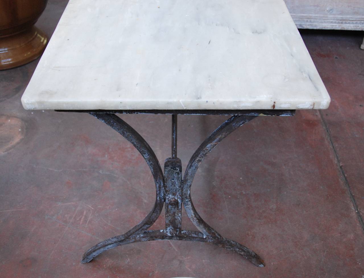 19th century iron marble-top table from Italy. Great aged patina on the iron. Original marble top. 