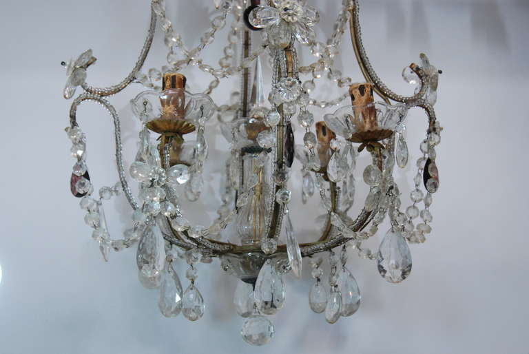 Beautiful pair of 19th c. Italian crystal chandeliers. Lovely purple tear drop crystals with amethyst crystal drop in the middle.