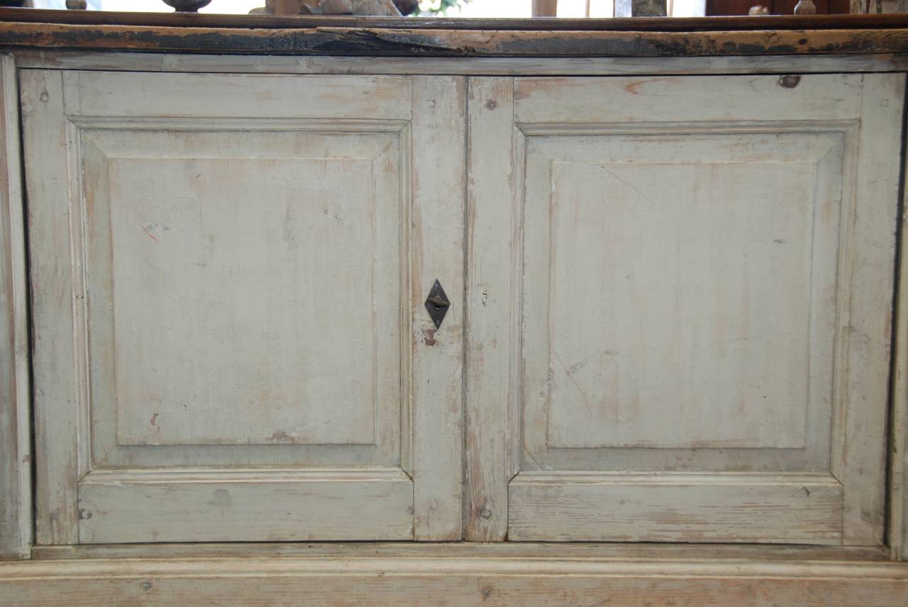 19th century Italian painted four-door enfilade. Paneled painted doors with aged black top.