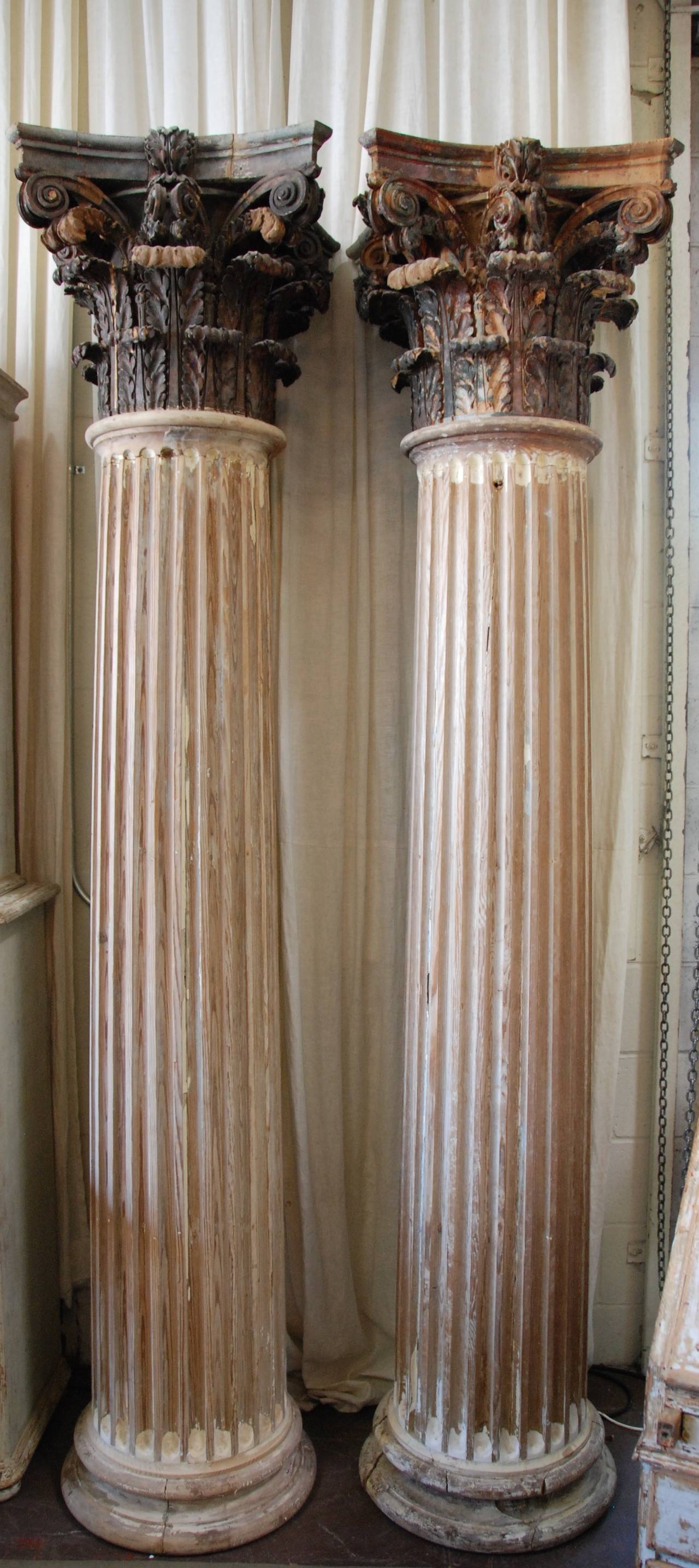 Grand pair of 19th century French wood columns. Great aged patina.