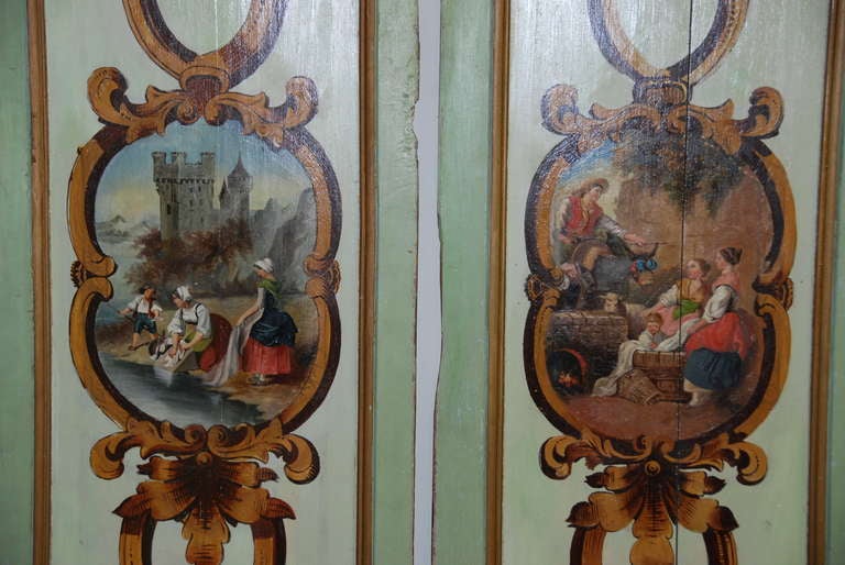 Pair of 19th c. painted panels removed from a large boiserie in Paris, France. Lovely pastoral scenes painted on French green walnut panels.