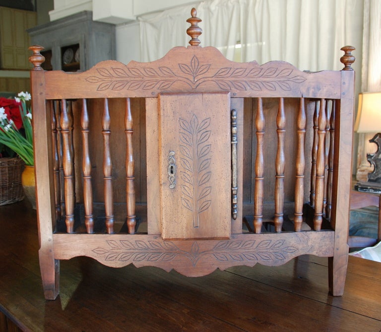 19th Century Walnut panetiere from Provence, France. Lovely carving on a scalloped base. Original hardware