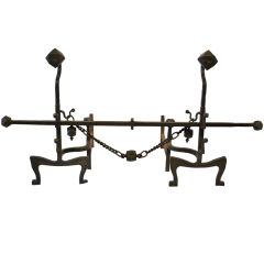 Hand wrought andiron set, in the style of Samuel Yellin