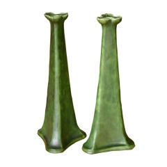 Pair of large candlesticks by Charles Volkmar