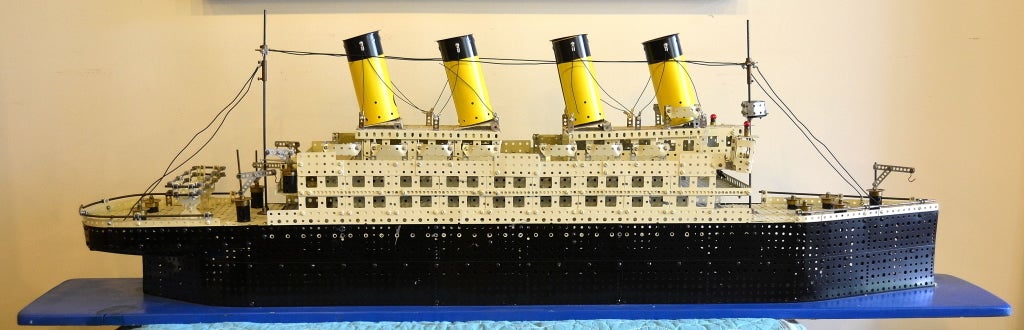 This large model of the Titanic was used as a store display in a NYC toy store in the 1950's. It is wired to operate the lights by battery.