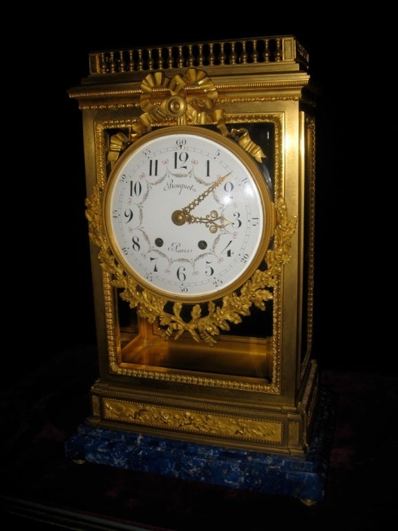 A very large and quite impressive antique French Louis XVI doré
bronze clock with a rectangular lapis lazuli base, signed 