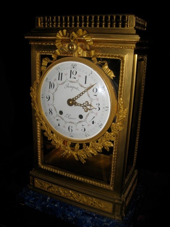 Antique French Louis XVI Doré Bronze Clock with Lapis Lazuli Base In Excellent Condition For Sale In New York, NY