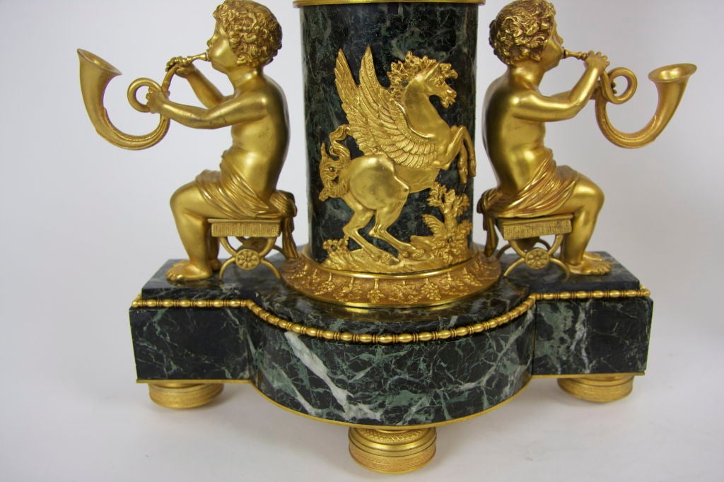Gilt Unusual Pair Of Russian Empire Figural Bronze Candelabras For Sale