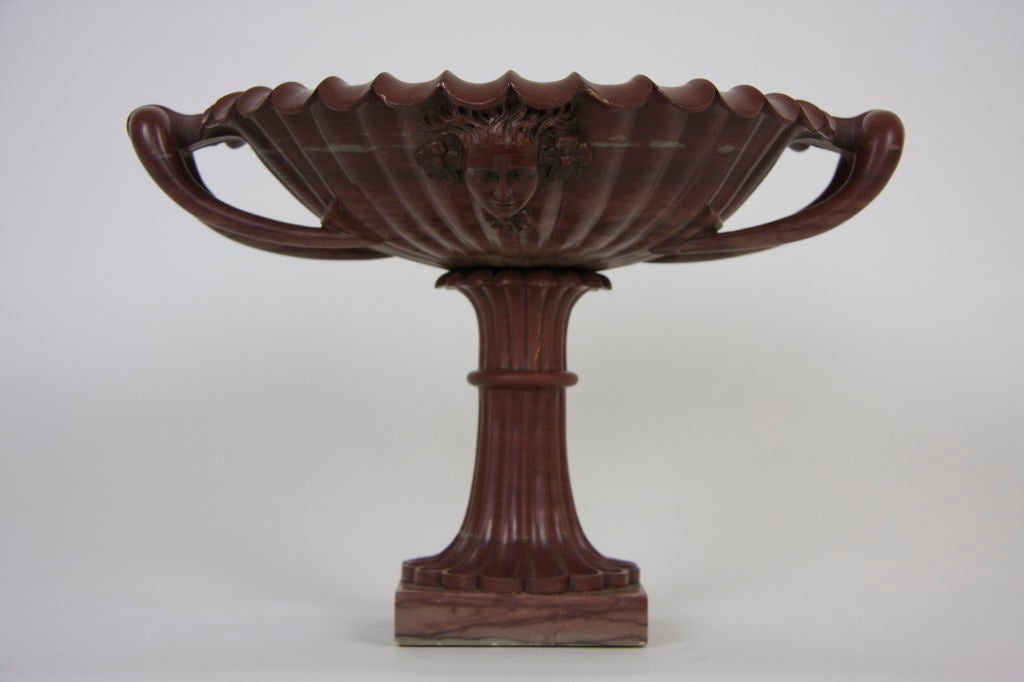 A BEAUTIFULLY HAND CARVED ITALIAN GRAND TOUR RED MARBLE NEOCLASSICAL DOUBLE HANDLED CENTERPIECE HAVING A CARVED NEOCLASSICAL FACE OF A MAIDEN