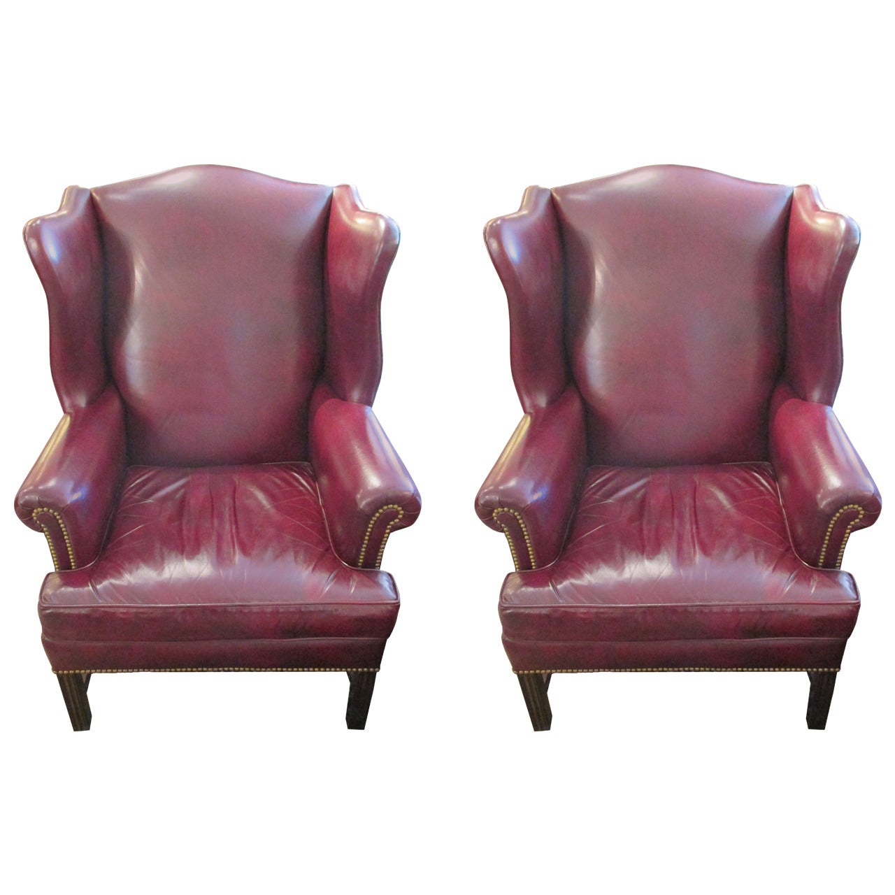 Pair of Rich Cordovan Leather Wing Chairs