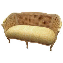 Carved and Caned French Settee with Retro Fortuny Fabric