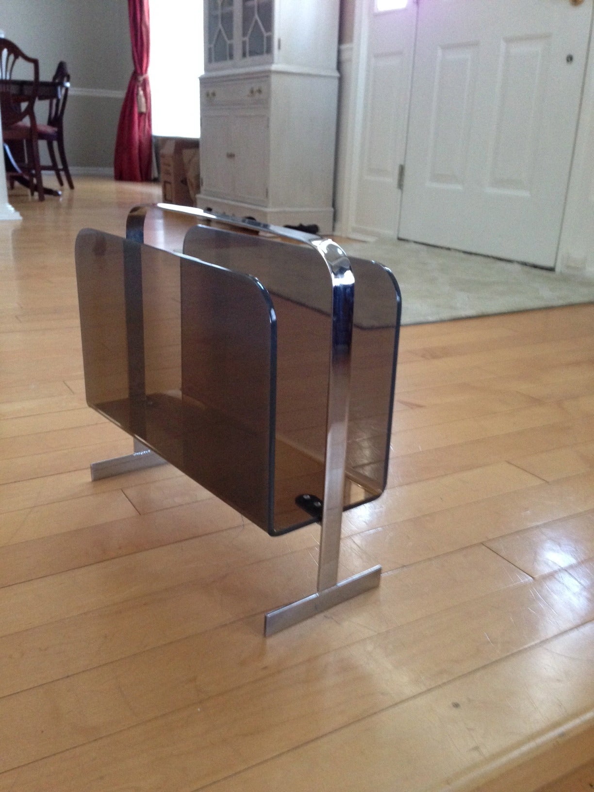 Mid Century Smoked Lucite and Chrome Magazine Stand
in style of Milo Baughman