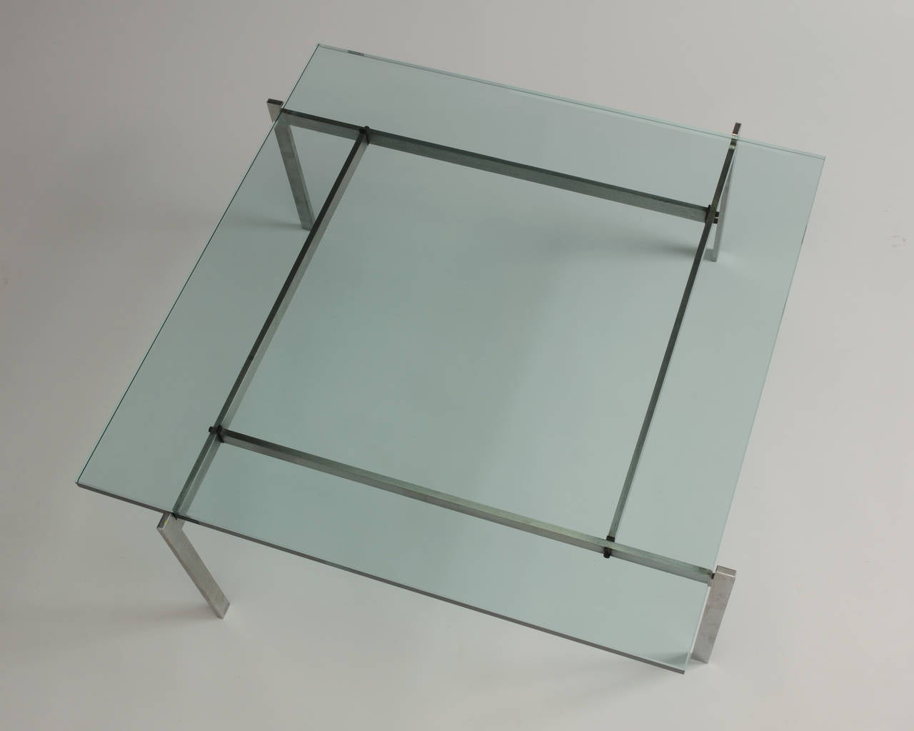 Manufactured by E. Kold Christensen, Denmark in the early 1960s, the table has a satin steel frame with a glass top.
Marked on the satin steel frame; Poul Kjaerholm PK 61 coffee table with Provenance from a Princeton University Professor available