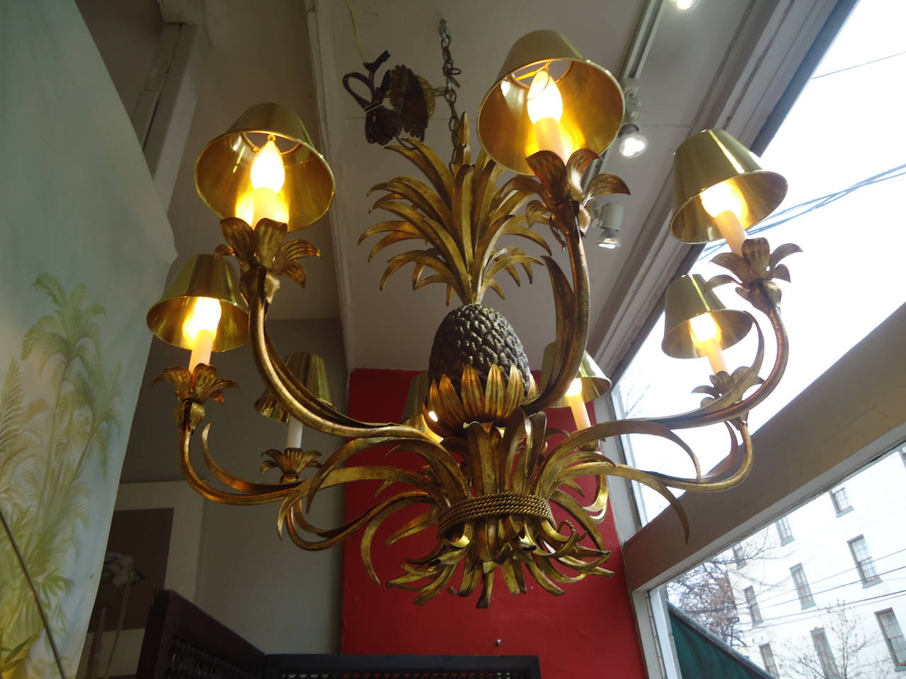 Wonderful Italian Classic pineapple motif chandelier, warm and glitzy gilded metal, eight arms, 40-60 watt each. Custom brass shades.
