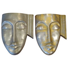 Pair of Industrial Age Art Deco Masks