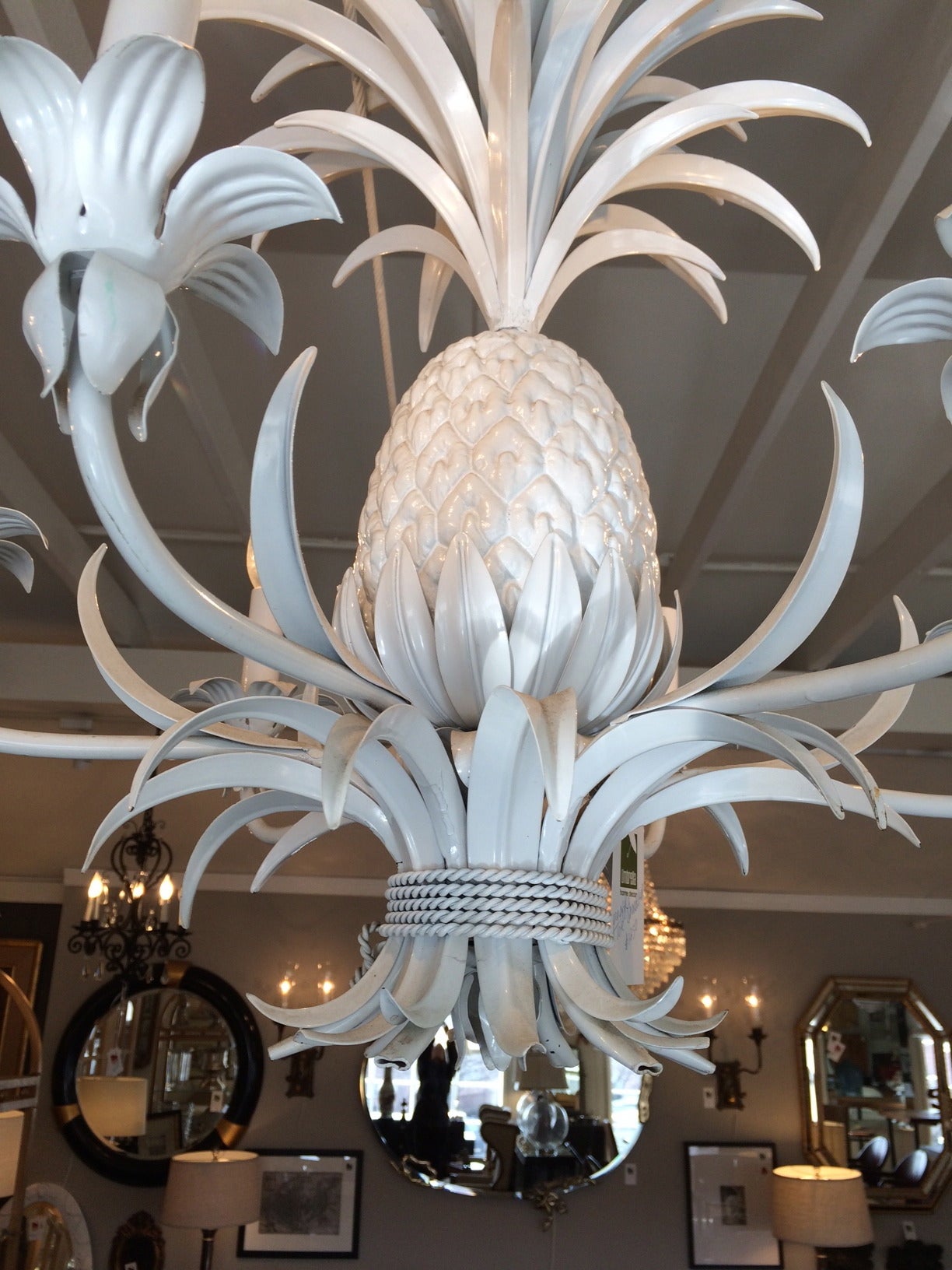 Vintage sophisticated tole chandelier with central pineapple and six arms, contemporized with shiny white paint.