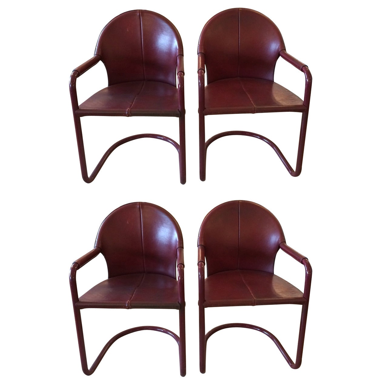 Four Rich Italian Cranberry Leather and Aluminum Armchairs
