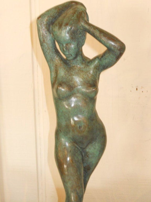 Lovely small sculpture by famous sculptor known more for his boxers than nudes
The green patina bronze stands on a simple cherry wooden base.
We represent the estate of the artist.