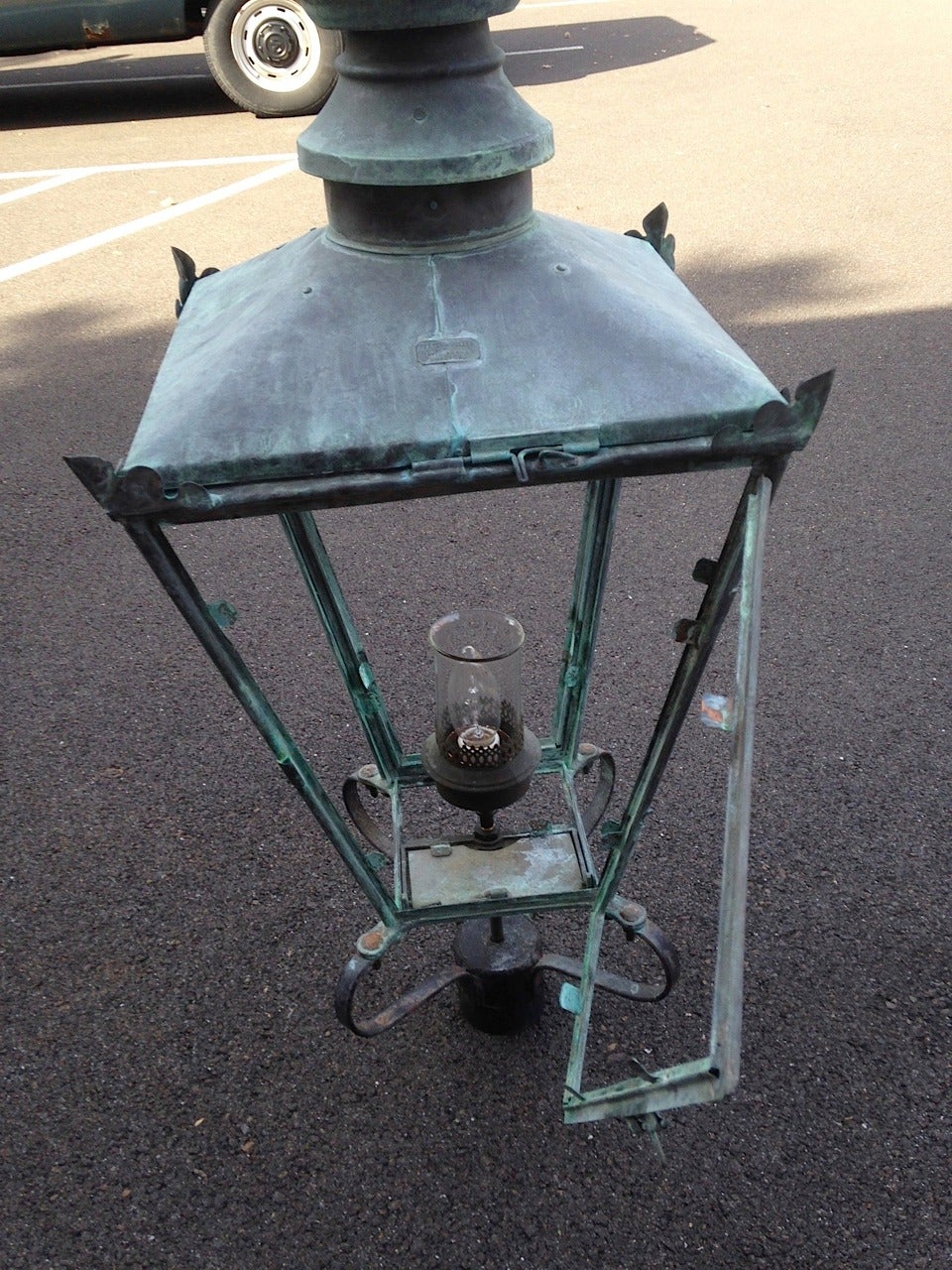 Wonderful 19th century English Copper Post Lantern, originally a gas lantern, now re-wired for electricity.  An original applied boss on the top reads “Foster & Pullman Ltd. Anvil Works Bradford”   Great patina, lacks glass but clips are there to