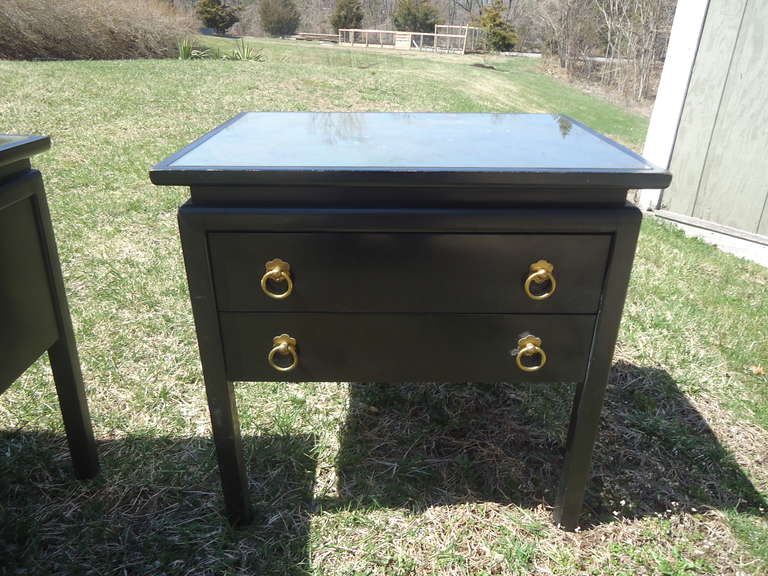 Modern nightstands or endtables,  gold mirrored tops, two drawers.