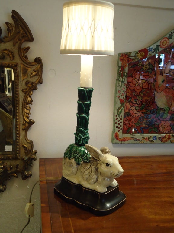 Beautifully detailed majolica bunny rabbits with candlestick tops turned into lamps; custom wooden bases and lampshades