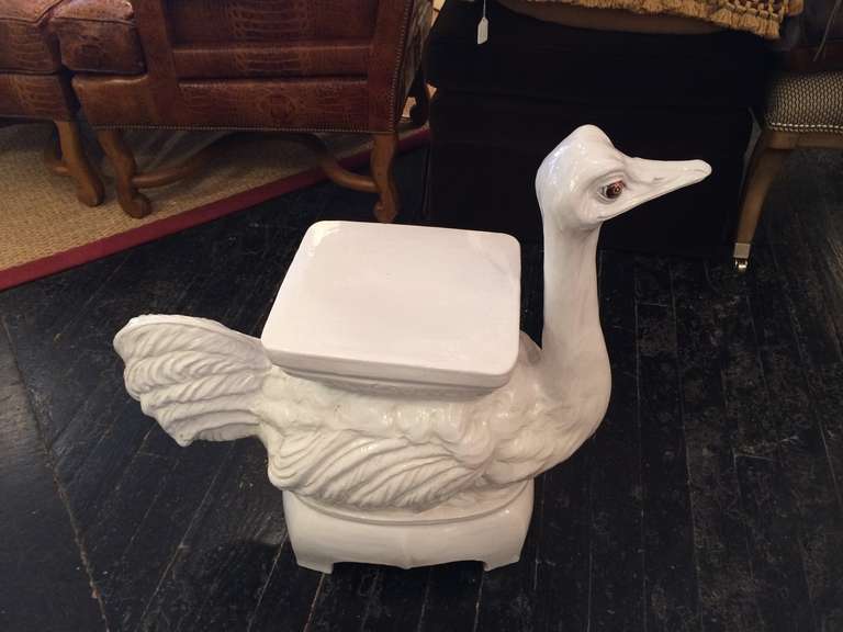Adorable ostrich ceramic table by Mottahedeh, signed on bottom.
Table top surface measures  11 x 12
Table height is 18