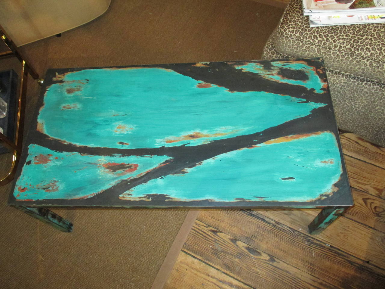 Dark patina metal coffee table enameled in fabulous shade of turquoise and acid etched by artist; signed Labb (underside of leg); USA; 1970s.