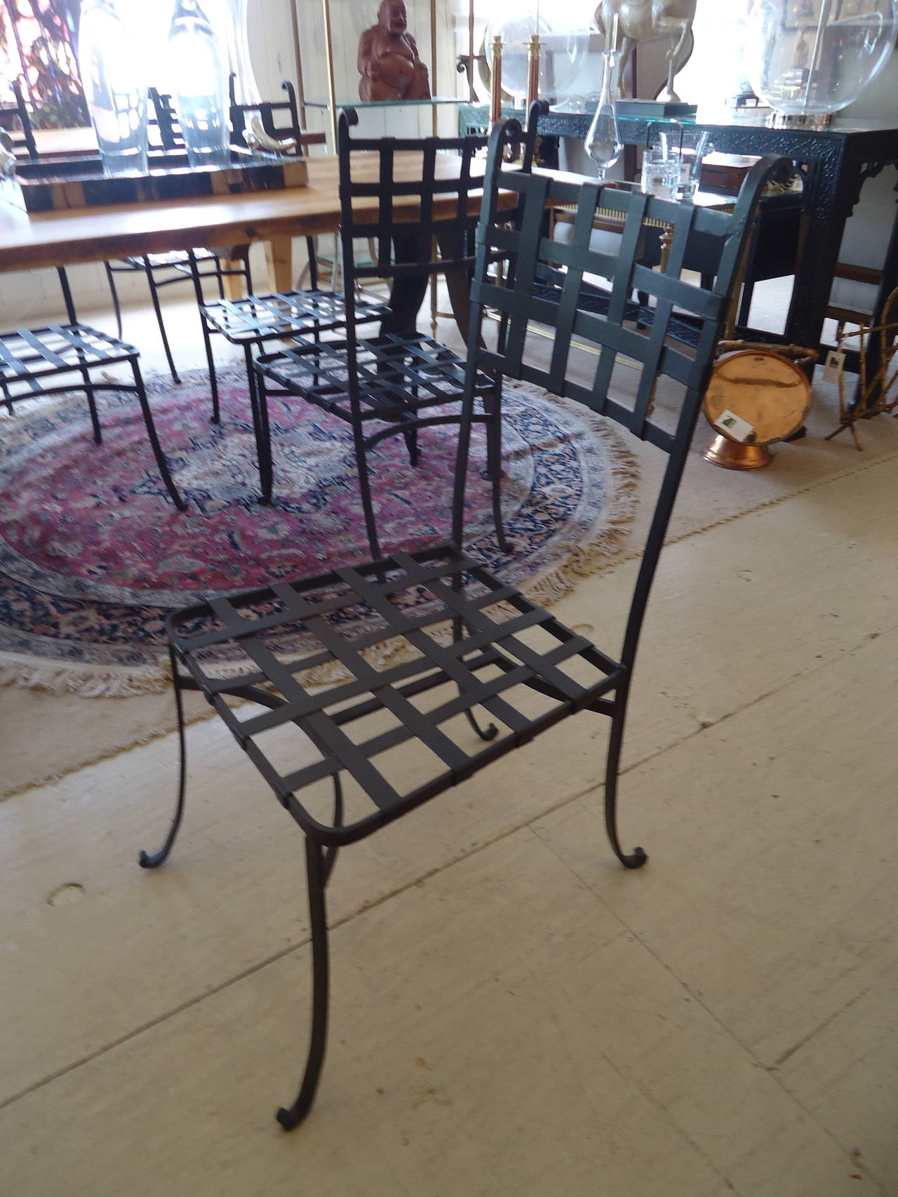 Hand wrought iron, 1940's dining chairs.  Pretty enough to be used inside, but winners for the deck/garden.  Backs are 16.5 W  Seats 18.75 W
Need cushions.