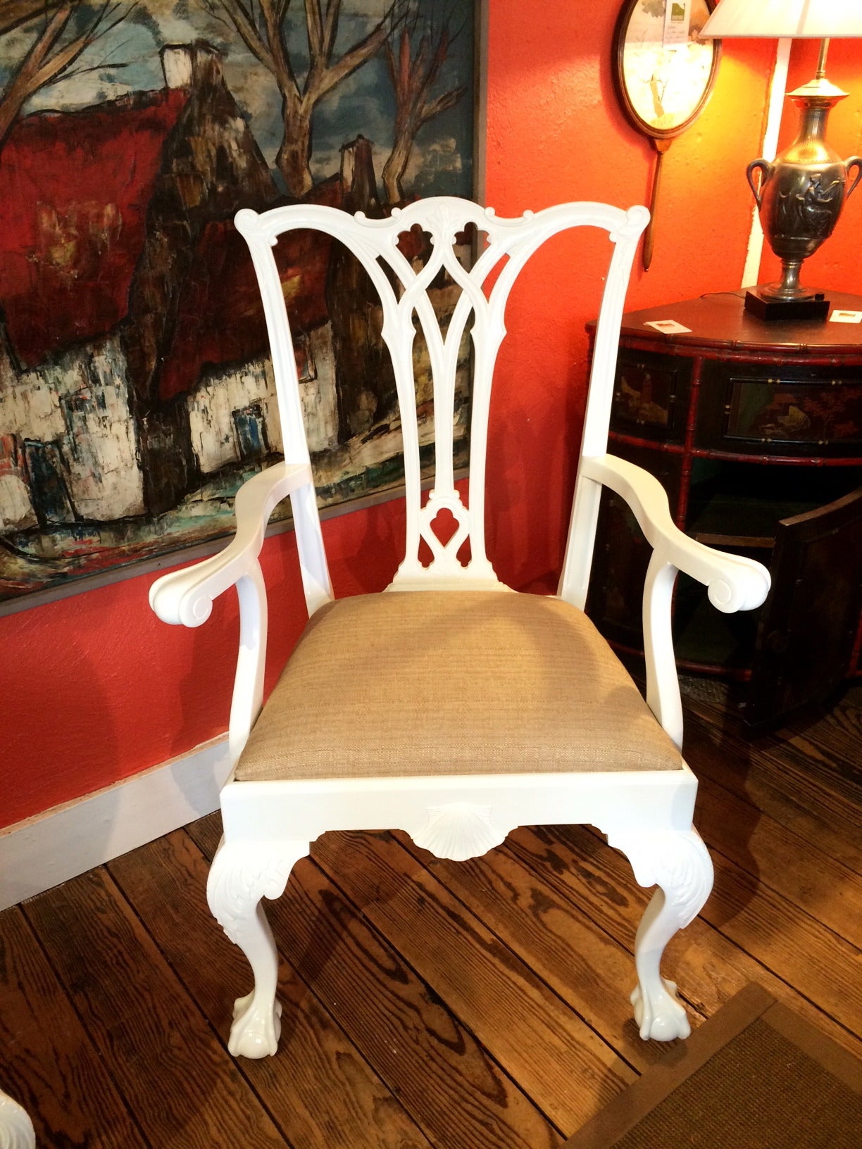Elegant set of ten Centennial Chippendale style mahogany dining chairs, newly restored in white lacquer with neutral beige linen seat cushions. Two armchairs, eight side chairs. Ball and claw feet.
Dimensions: Armchairs: 
S/H 18 40.5 H 22 D. 
28