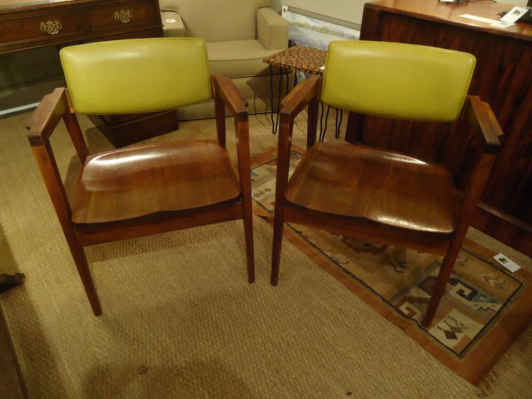 Extremely well built architectural chairs, embossed in the rear leg with a brass rondel with the company 