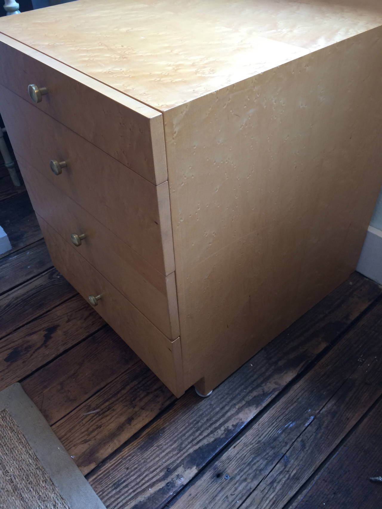Mid-century modern chests with three drawers in each and a pull-out extension surface on top. Blonde tiger maple. Would make great nightstands with three drawers for extra storage and space for lamps on top. Probably by Van Leigh, but no markings.