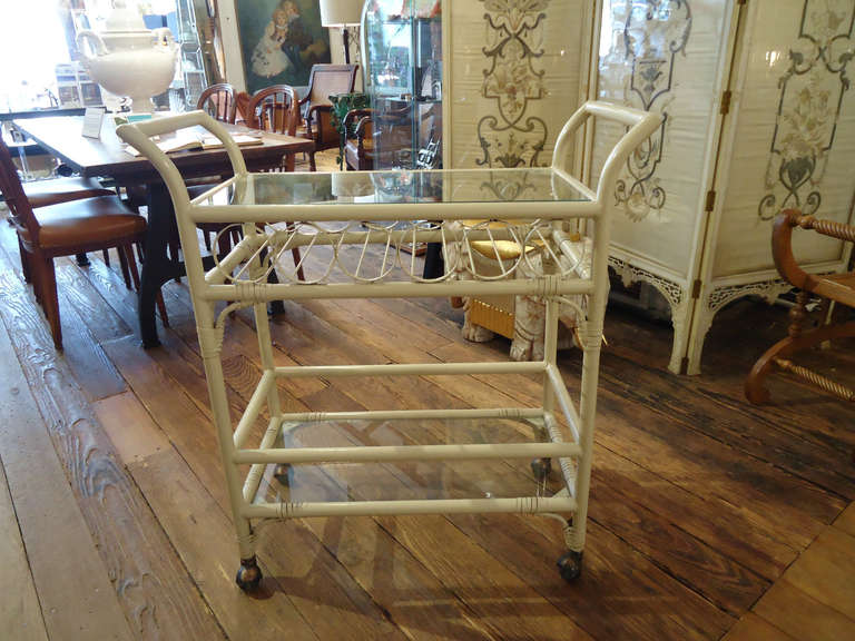 Very stylish faux rattan or bamboo metal bar cart, circa 1950, great condition, sturdy and functional
34